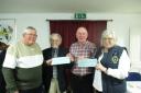 Lodge Chairman, David Craddock, presenting the charity cheques