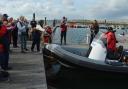 The new safety boat for Chesil Sailability has been named at a ceremony