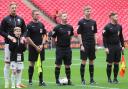James Durkin, centre, refereed the National League play-off final at Wembley