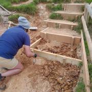 Rangers carrying out maintenance work on steps on Lulworth estate