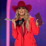 Lainey Wilson accepts the award for entertainer of the year during the 59th annual Academy of Country Music Awards on Thursday at the Ford Centre in Frisco, Texas (Chris Pizzello/AP)