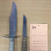Two knives and an amount of cannabis were found and seized.
