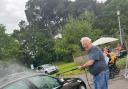 Peter, who lives at Elizabeth House, has a go washes cars during the fundraising event