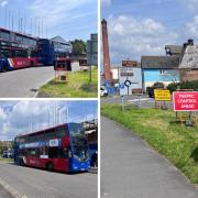 Buses on Spring Road in Weymouth with warning signs prior to the roundabout