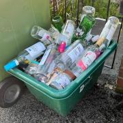 Overfilled glass bottle collection box