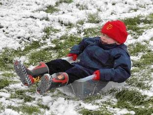 George Livsey enjoying the snow at Maumbury Rings.