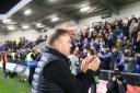 Bobby Wilkinson applauds Weymouth's travelling support after the FA Cup exit at AFC Wimbledon