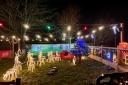 Locals light up pub garden with donated Christmas decorations
