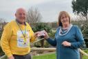 Eileen Bramley, the Chairperson of Phoenix Fundraisers of Osmington presented £100 to Richard Crosby of Dorchester and Weymouth Fundraising Group for Marie Curie