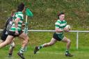 Cohen Emery, right, runs in for Dorchester's only try against Sherborne