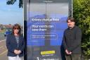 Tracy Jose and Cllr Kieron Wilson in front of AI bus shelter