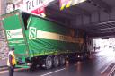 Traffic delays as lorry gets stuck under bridge in Taunton town centre