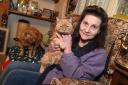 SUPPORTING THE CATS: Lynda Downton of Feral Cat Care will be spending a night on the streets to raise money and awareness of feral cats, pictured here with cat Norma, Picture: GRAHAM HUNT