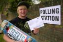 First time voter Laurie Thomas with his polling card