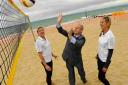 NET GAINS: Olympic torch relay celebrations at Boscombe beach with two of Team GB Women’s Beach Volleyball, Lucy Boulton, Cllr Peter Charon, and Denise Johns. Picture: Samantha Cook