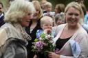 The Duchess of Cornwall meets a young mum and baby