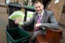 Steve Burdis of DWP with leaflets detailing changes in the waste collection services