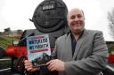 LAST JOURNEY: Andrew Britton with his book Waterloo to Weymouth