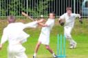 IN THE AIR: Budmouth's Callum Tilsed goes for a big hit during the cricket festival at Dorchester