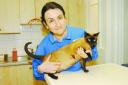 EMERGENCY CARE: Veterinary Nurse Simone Sharp with the injured cat