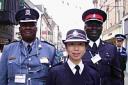 COMPARING METHODS: Superintendent Peter Ntaya Tshepo from Botswana and Superintendent Wendell Deveaux from the Bahamas with Senior Superintendent Jocelyn Cheung of Hong Kong Police in Dorchester