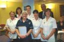 WINNING TEAM: Trust Chairman Robin SeQueira with staff from the Short Stay Unit and Surgical Admissions Lounge