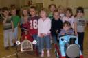 crossways playgroup children with new train and fire engine