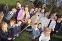 GREEN FOCUS: Teacher and Comenius Project organiser Jane Gardiner and pupils at St Augustine’s Primary School with their newly-planted tree F7792
