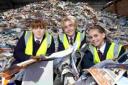 DISCOVERING MOUNTAINS OF RUBBISH: Students (from left) Chloe Watson, Jake Perrett and Emily Aves learn about Dorset’s recycling
