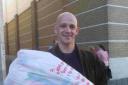 Bryan Smith leaves Woolworths in Weymouth with presents for his daughters