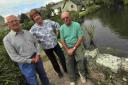 Dave Caddy, right, with John Allen and Maureen Morris by the pond in Sutton Poyntz