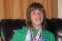 LONDON FOCUS: Maxine Moore proudly displays her medal haul