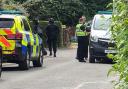 Police officers, including armed officers, on Howard Close, Weymouth. Picture: Josie Klein/Dorset Echo