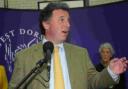 Triumphant Conservative candidate Oliver Letwin makes a point during his victory speech in Dorchester
