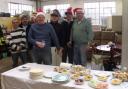 Volunteers and supporters enjoy their Christmas buffet at Second Chance HQ