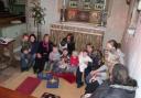 Tots and grownups celebrate with Revd Debbie Smith at All Saints, Wyke