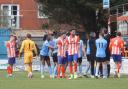 Braintree's Alfie Pavey, out of shot, is shown a red card for poor tackle on Tom Blair