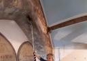 Margaret Horton pulls on the sally to ring the bell for the Sunday service