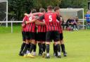 Bridport celebrate their opening goal during the 3-2 win over Newton Abbot Spurs