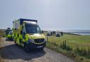 Woman rescued after falling from coastal path
