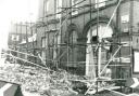 The scene on the Saturday morning in 1984: fallen brickwork, damaged scaffolding and broken windows