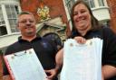 SAVE OUR SEA HEROES: Mark Bowditch and Stella Roper with the coastguard centre petition