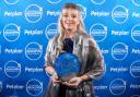 Johanna Moore picking up the PetPlan 2024 Practice Manager of the Year at the awards night in Manchester