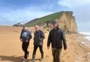 Sir Ed Davey joins Giles Bristow and Edward Morello on the beach at West Bay
