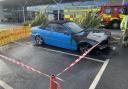 Convertible catches fire in supermarket car park
