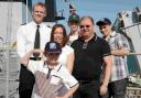 ALL ABOARD: Luke Joseph tours HMS Bulwark with Captain Alex Burton and foster parents John and Celia Arnell and foster brothers Jonathan Robinson and John McDonnell