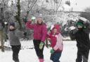 Pupils from Greenford primary school enjoying the snow