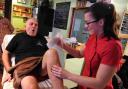 PEEL APPEAL: John Fiori gets his legs waxed