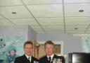GOODBYE: Peter Nash, left, receiving his VRSM medal from Commodore Jamie Miller