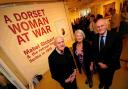 Captain Michael Fulford-Dobson, Kate Adie and Dr Peter Down at the entrance to the exhibition